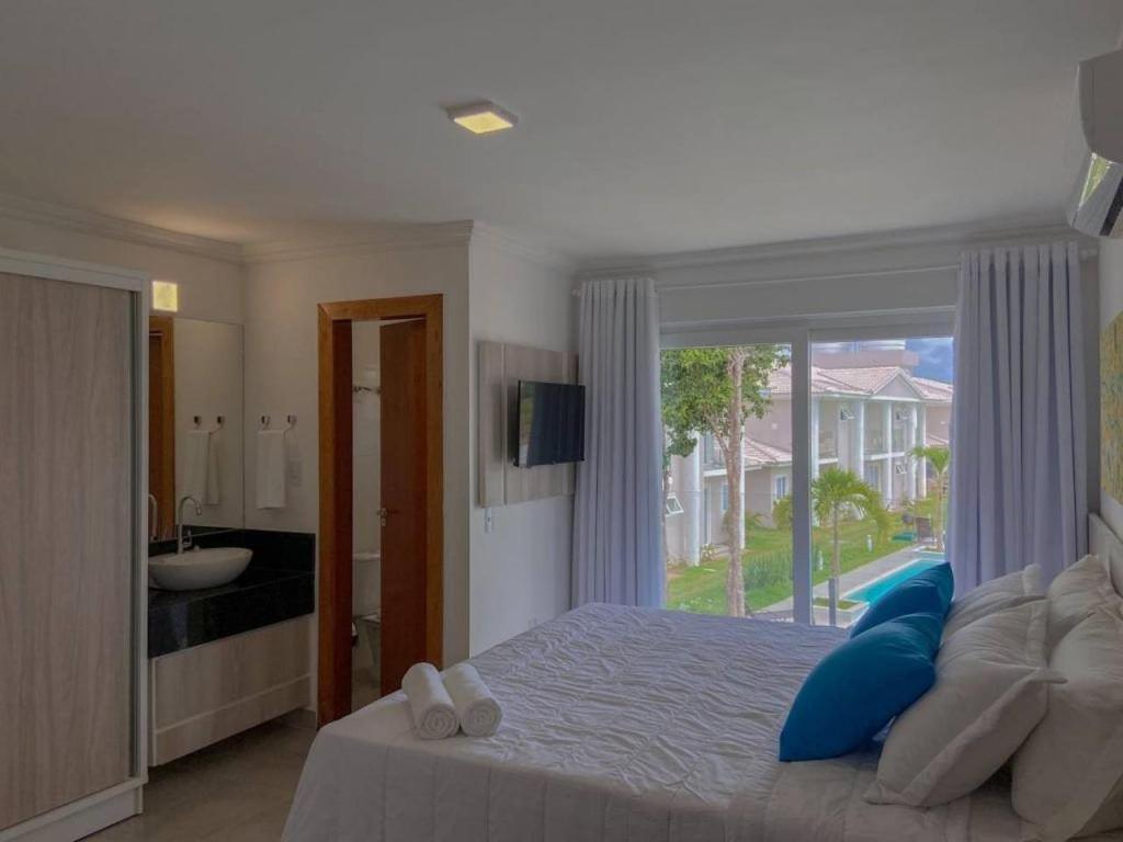 Casa Em A 200m Da Em Arraial D'ajuda, Com 3 Suites, Sala Climatizada, Area Gourmet Privativa, Internet 300mbps, Com Piscinas Adulto E Infantil, Sauna, Quadra De Tenis E Portaria 24hrs. Casa de férias *