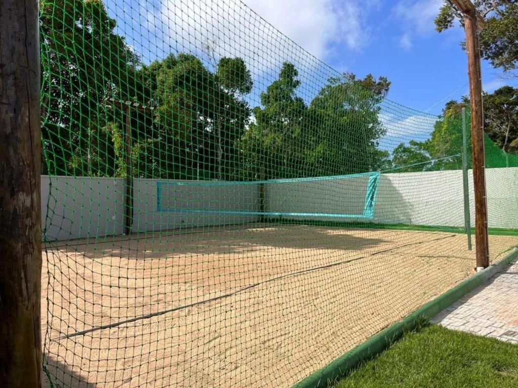 Casa de férias Casa Em A 200m Da Em Arraial D'ajuda, Com 3 Suites, Sala Climatizada, Area Gourmet Privativa, Internet 300mbps, Com Piscinas Adulto E Infantil, Sauna, Quadra De Tenis E Portaria 24hrs.